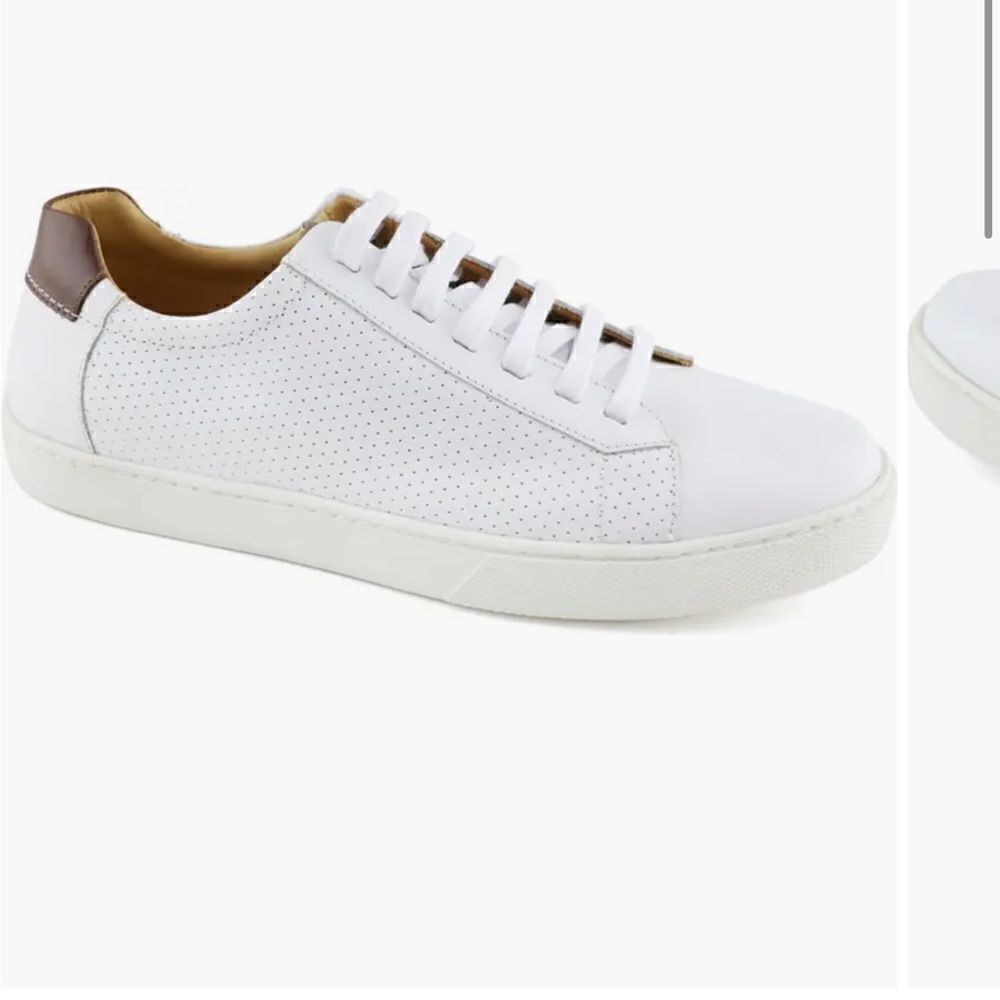 Marc Joseph perforated white leather sneakers. Size 10